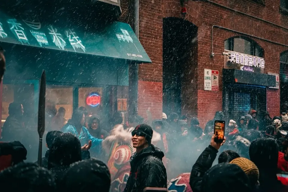 Snow, smoke, and a whole street holding its breath.
